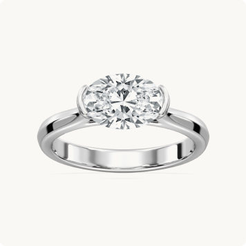  Oval Lab Grown Diamond 1 1/2ctw. East West Solitaire Engagement Ring in 14k White Gold image number null Oval Lab Grown Diamond 1 1/2ctw. East West Solitaire Engagement Ring in 14k White Gold image number null Oval Lab Grown Diamond 1 1/2ctw. East West Solitaire Engagement Ring in 14k White Gold image number null Oval Lab Grown Diamond 1 1/2ctw. East West Solitaire Engagement Ring in 14k White Gold image number null   Try It On Engagement Rings / Shop by Metal Color / White Gold / Oval Lab Grown Diamond 1 1/2ctw. East West Solitaire Engagement Ring in 14k White Gold Oval Lab Grown Diamond 1 1/2ctw. East West Solitaire Engagement Ring in 14k White Gold: Oval-cut diamond solitaire ring with a smooth, high-polish white gold band.