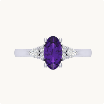 Oval Amethyst with Pear-Shaped & Brilliant-Cut Lab Grown Diamonds Ring in 10k White Gold: Oval-cut purple amethyst ring with pear-shaped diamond accents on each side, set in a two-tone white and gold band.