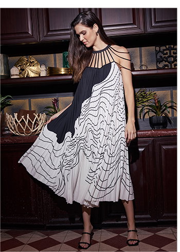 Black Pleated Maxi Dress With Knife Pleats and Contrasting Black and White Abstract Design and Open Yoke Neckline