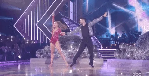 Hannah Brown and Alan Bersten spinning on Dancing with the Star.