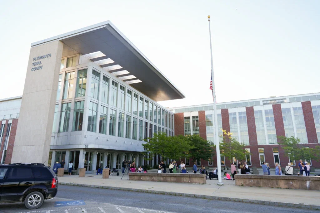 People wait on line to enter Plymouth Superior Court during Lindsay Clancy's murder trial on August 26, 2026 in Plymouth, Massachusetts.