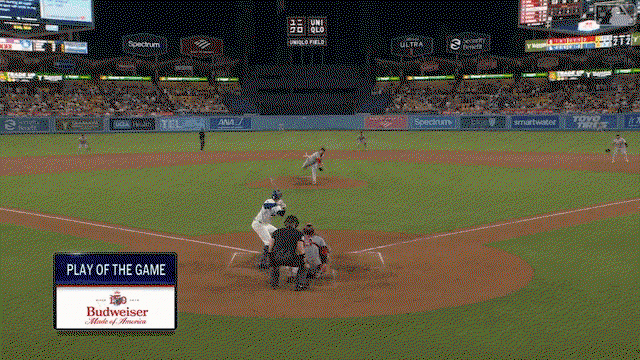 An animated gif of Ryne Stanek kicking a ground ball in the air to himself