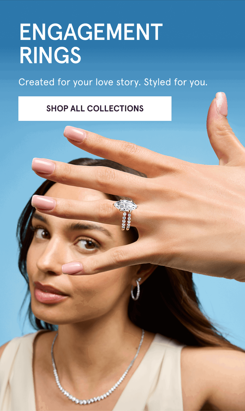 Model with marquise-cut diamond ring, eternity band & tennis designs. Engagement rings. Click here to shop all collections
