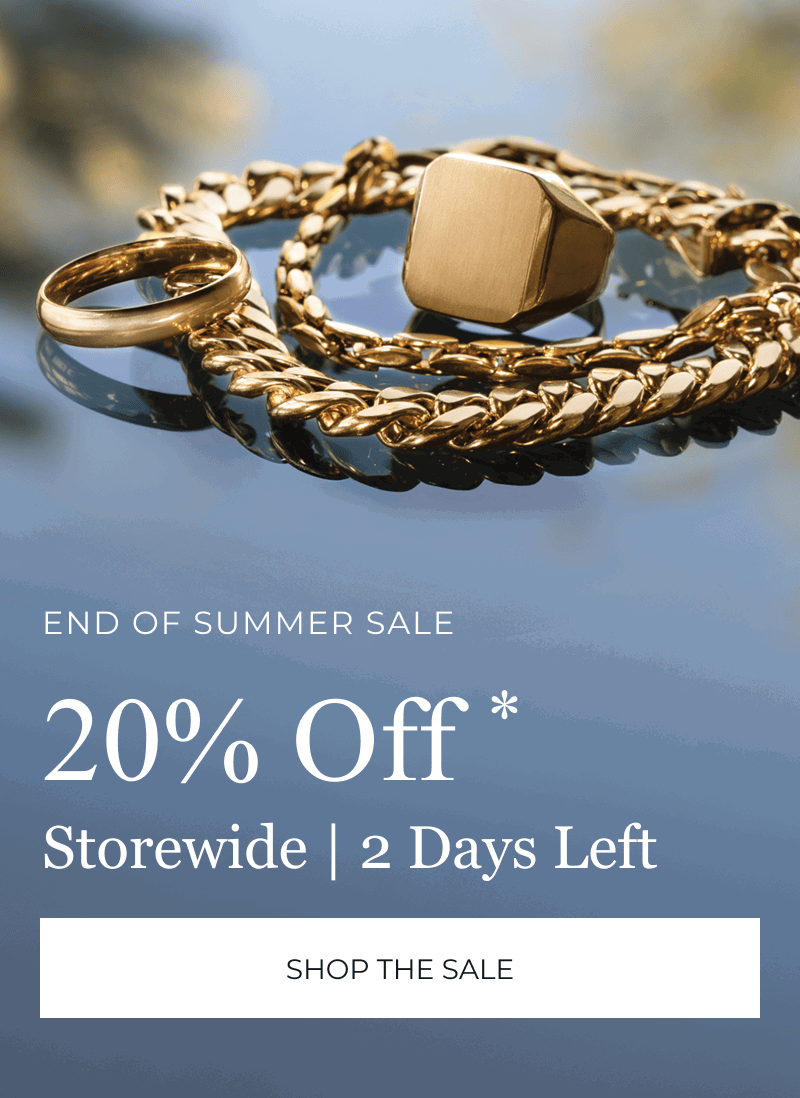 Men’s gold jewelry on reflective surface. End of Summer Sale. 20% off storewide. 2 days left. Click to Shop The Sale