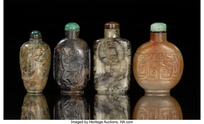 27035&colon; A Group of Four Chinese Carved Jade Snuff Bottle