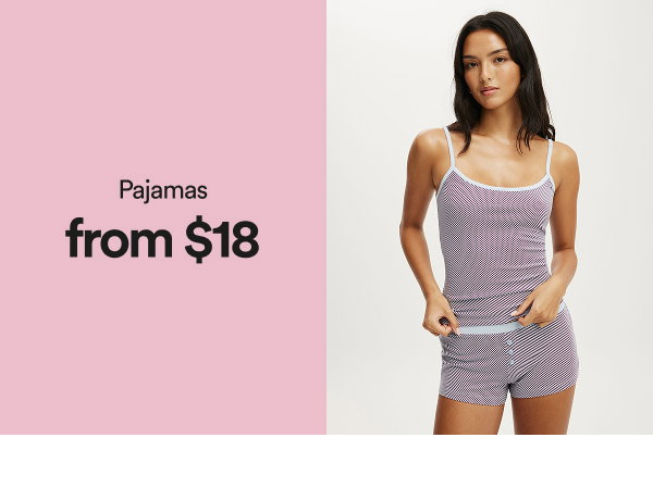 Pajamas from $18. Woman wearing purple ribbed camisole and shorts set