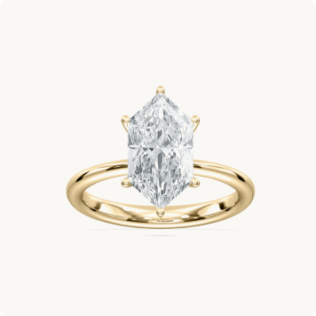 Duchess Marquise Lab Grown Diamond 2ctw. Solitaire Engagement Ring in 14k Yellow Gold: Elongated hexagonal-cut diamond solitaire ring set in a yellow gold band with claw prongs.