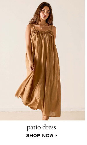 Patio Dress - Shop now - Image of a woman wearing a light brown maxi dress