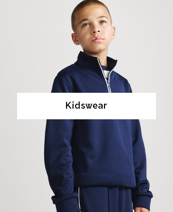 Boy wearing a Navy Half Zip Funnel Neck Sweatshirt