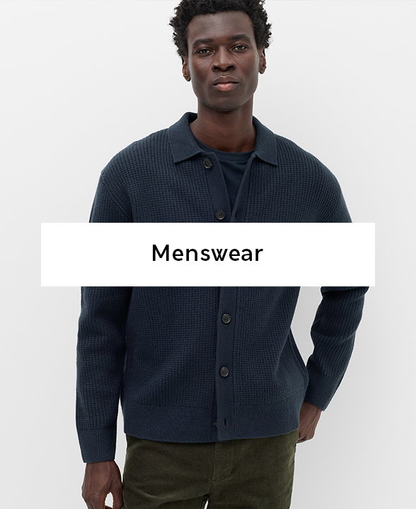 Man wearing a Navy Air Yarn Cable Knit Button Through Cardigan