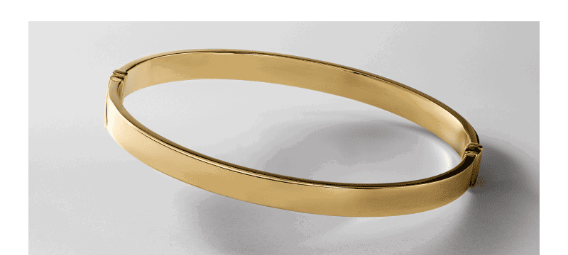 Polished yellow gold bangle bracelet with a hinged closure.