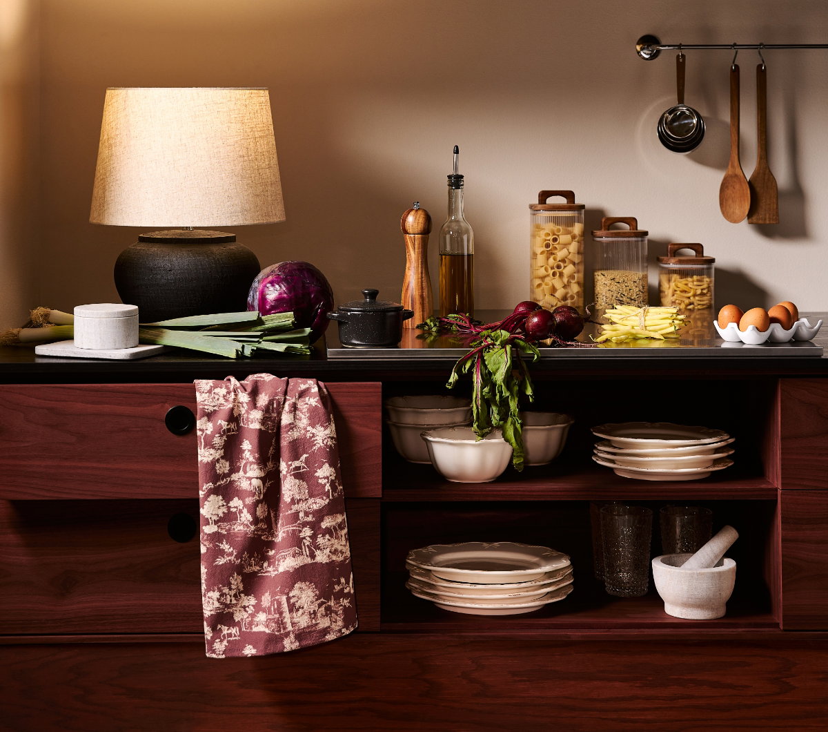 A counter well-stocked with kitchen items