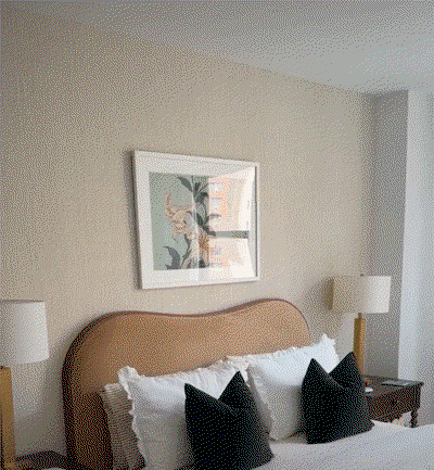 Gif image showing different angles of Tempaper's Faux Grasscloth wallpaper in Sand installed in a bedroom