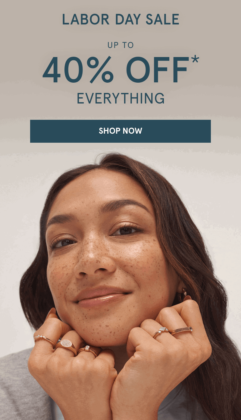 A model wearing stacked rings. Labor Day sale. Up to 40% off everything. Click shop now.