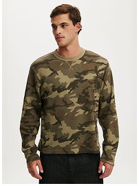 Men's camo sweatshirt worn by model against white background