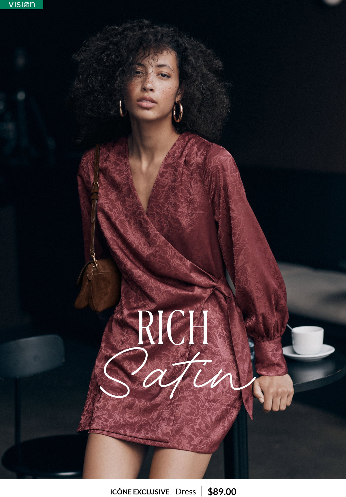 Woman wearing a merlot-coloured satin wrap dress for $89