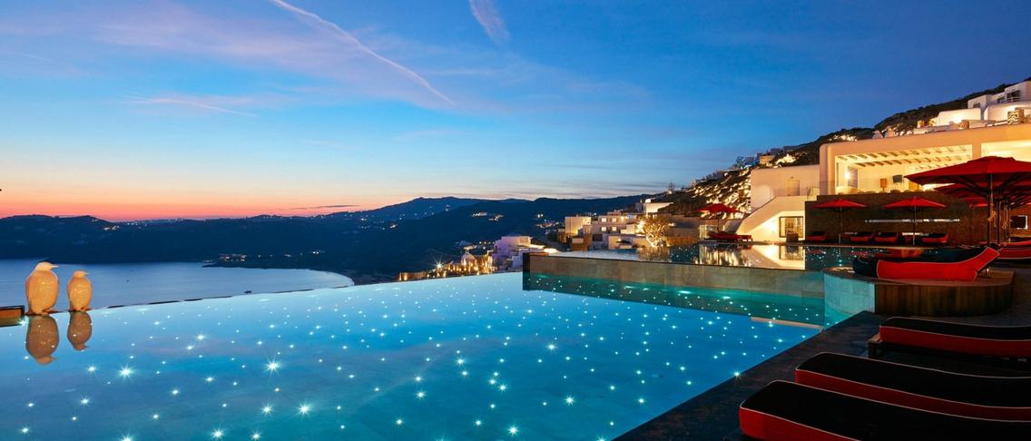 Modern Mykonos Haven with Daily Champagne Breakfast, Nightly Cocktails & Return Airport Transfers