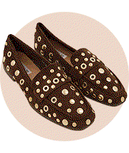 A GIF of brown, red and white shoes.