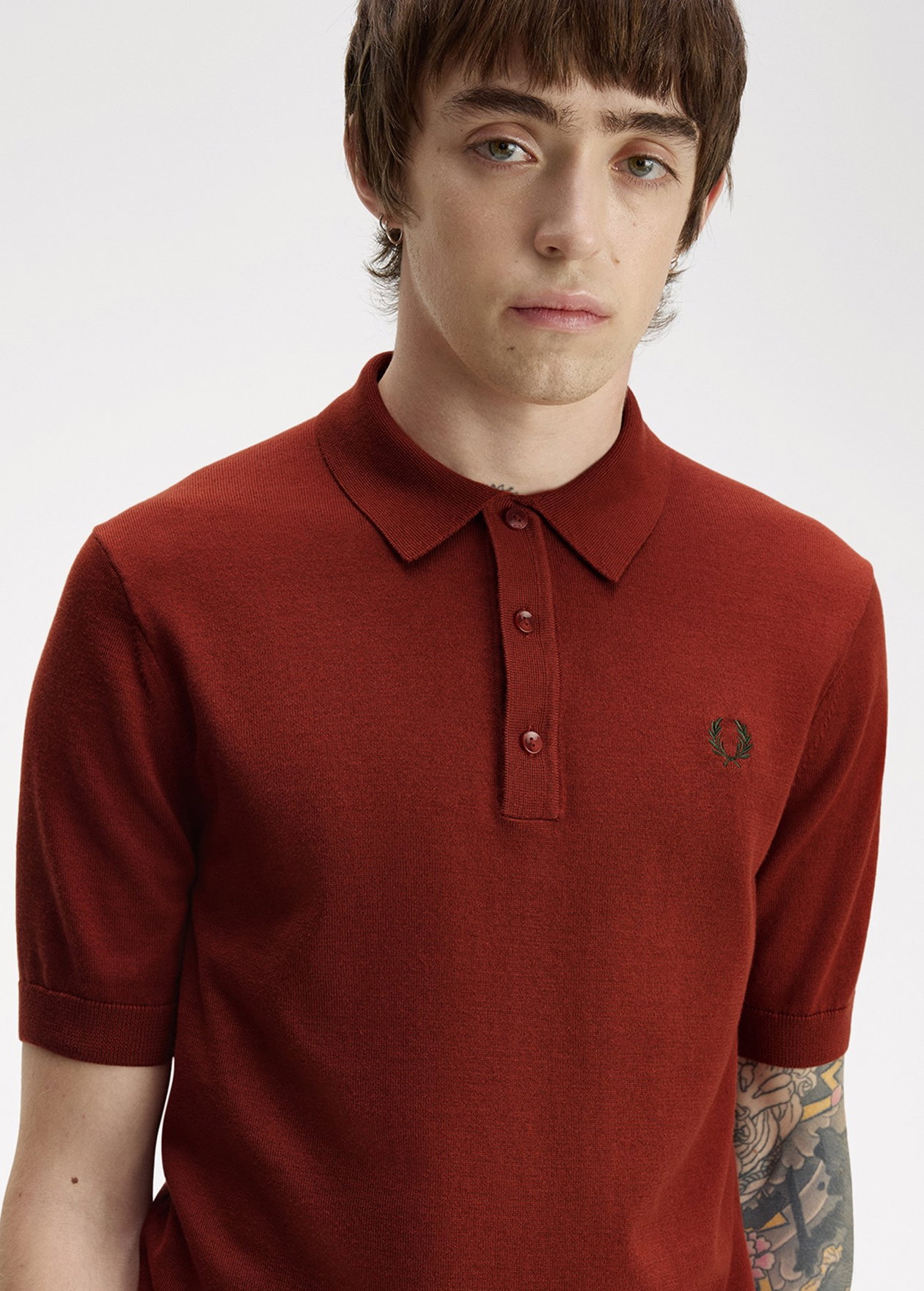 Male model wearing a Fred Perry Cotton Knitted Shirt in Brandy