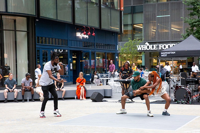 Members of The Missing Element dance onstage
