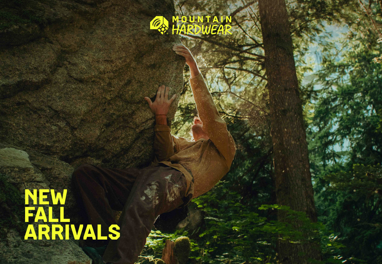 NEW FALL ARRIVALS. Someone bouldering in new MHW gear.