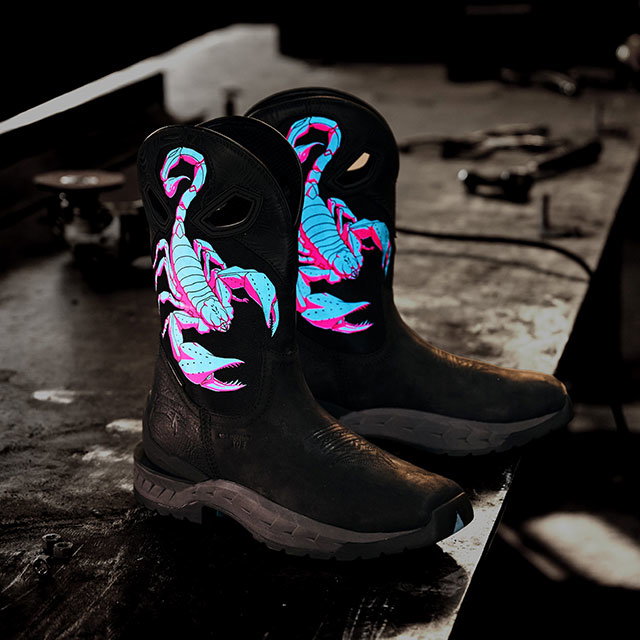 A pair of stinger boots in blue and pink and brown.