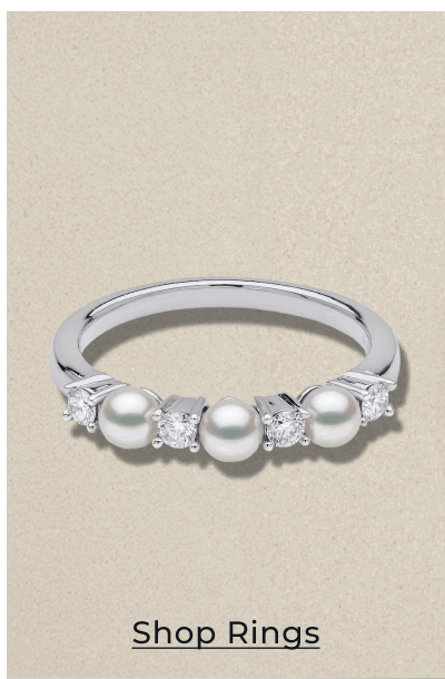 Ring with pearls and diamonds. Click to Shop Rings