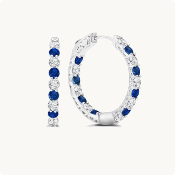 Blue & White Sapphire Inside-Out Hoop Earrings in Sterling Silver: Pair of hoop earrings alternating round blue sapphires and white diamonds set in white gold, shown from front and side angles.