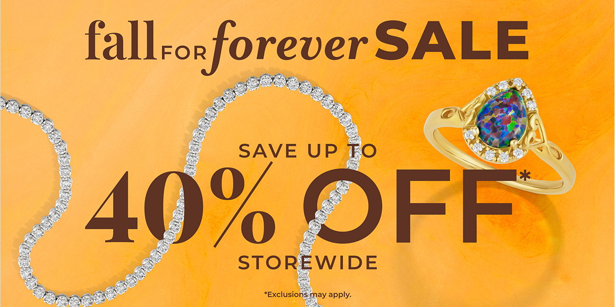 Diamond tennis necklace curved into loops beside a gold ring featuring a pear-shaped opal with a diamond halo, on an orange background with text reading 'Fall for Forever Sale, Save Up To 40% Off Storewide.'