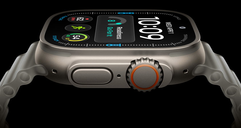 Apple Watch Ultra 4, titanium case, silver color; screen shows digital time display, health and fitness metrics