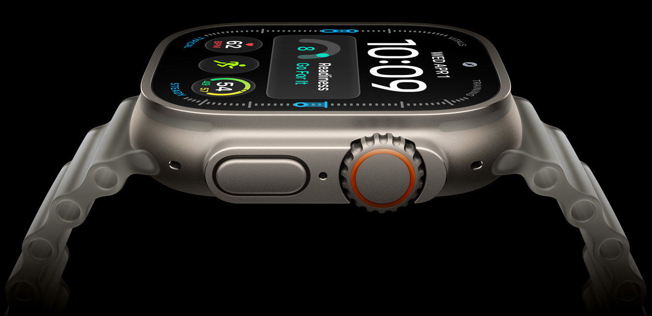 Apple Watch Ultra 4, titanium case, silver color; screen shows digital time display, health and fitness metrics
