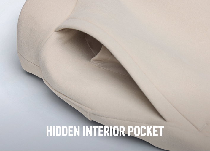 Close-up of a pocket on a white pair of sweats with text: HIDDEN INTERIOR POCKET