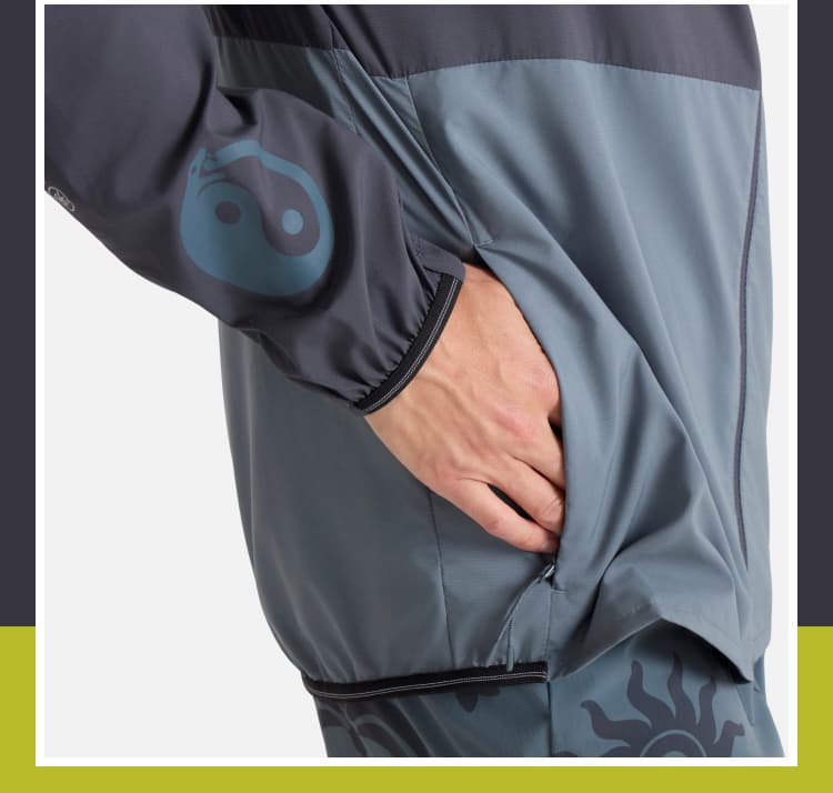 Crafted from ultra-light stretch ripstop fabric with a durable water-resistant finish, it offers reliable protection without compromising mobility.