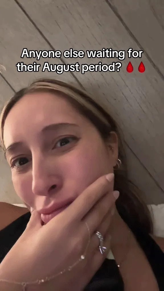 A GIF of a woman saying, "Anyone still waiting for their August period."