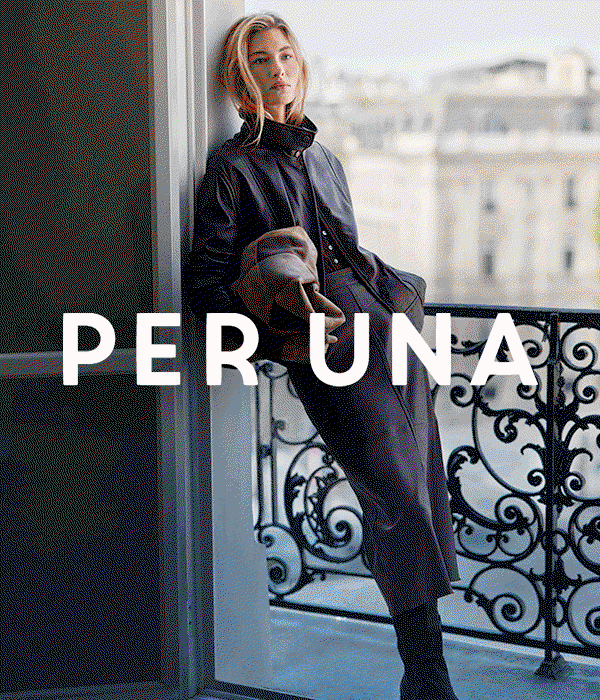 GIF of a woman wearing a Per Una Leather Funnel Neck Jacket in Raisin with a Leather Panelled Midi Column Skirt in Brown