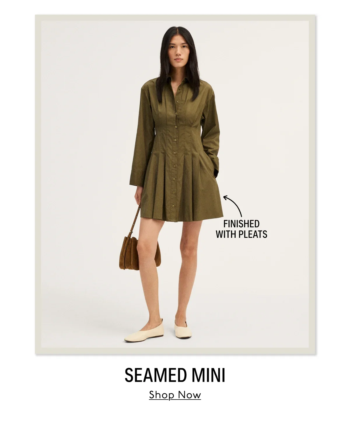 Seamed Mini - Shop Now. Finished with pleats.