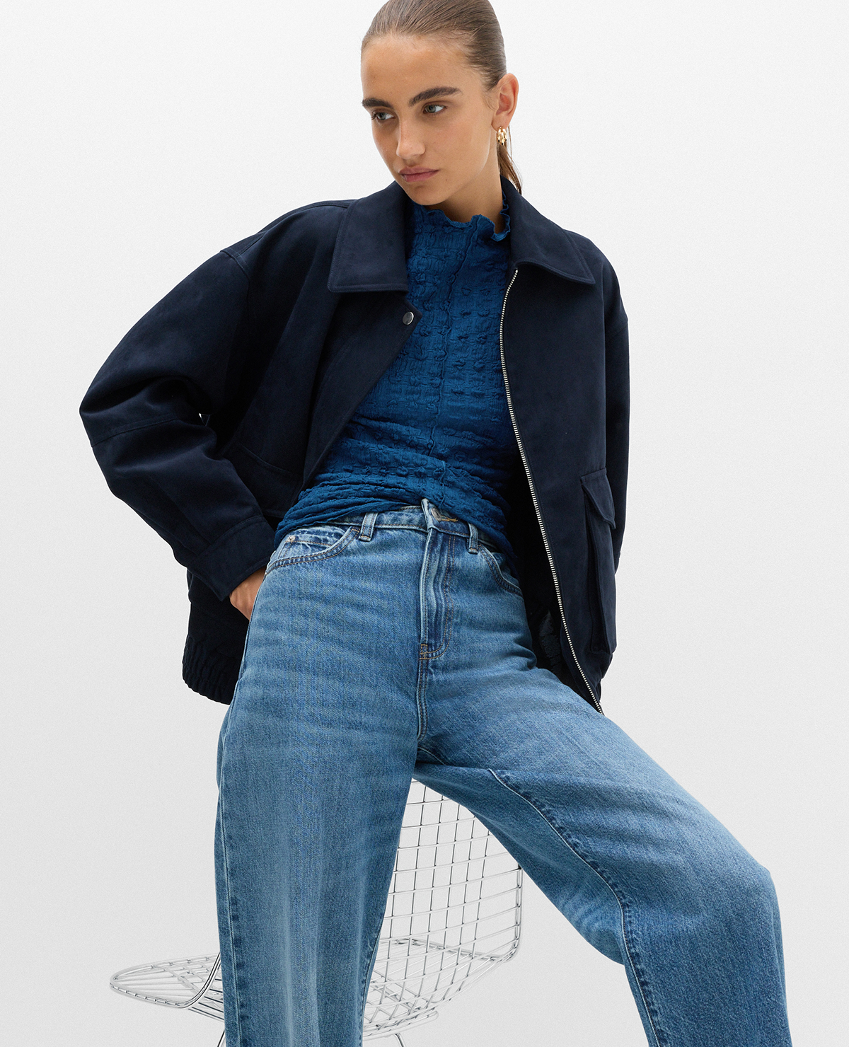 Woman wearing a Petrol Long Sleeve Funnel Neck Textured Top and a Midnight Navy Suedette Bomber Jacket