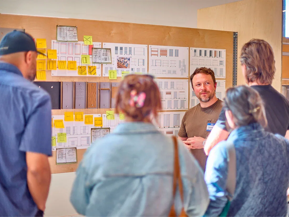 Grovemade product designer Sean Kelly leads a tour of our design process to a group of attendees.