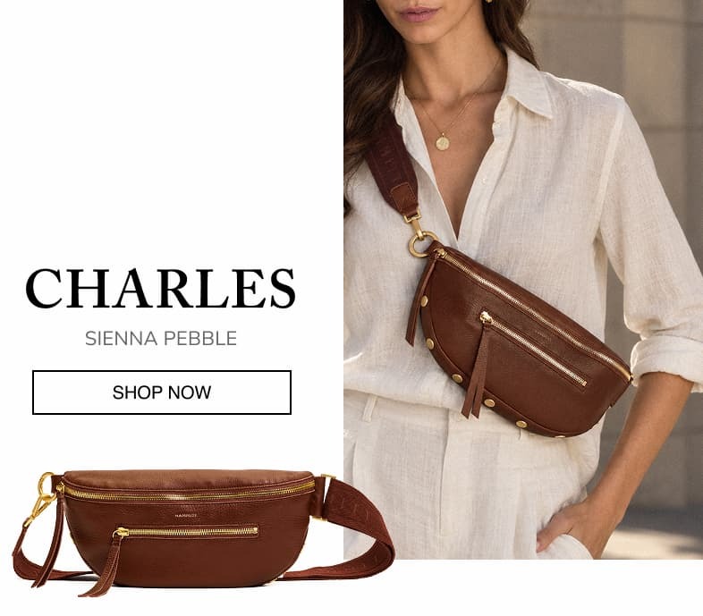 Charles in Sienna Pebble, a rich brown leather belt bag with gold hardware, shown on a model and as a product image. SHOP NOW.