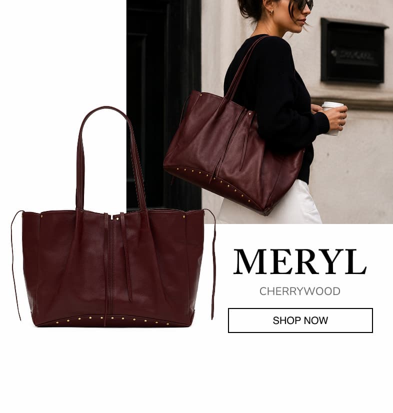 Meryl in Cherrywood, a deep burgundy leather tote with long shoulder straps and gold hardware, shown on a model and as a product image. SHOP NOW.