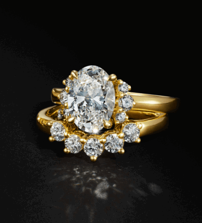 Gold engagement ring with matching diamond wedding band.
