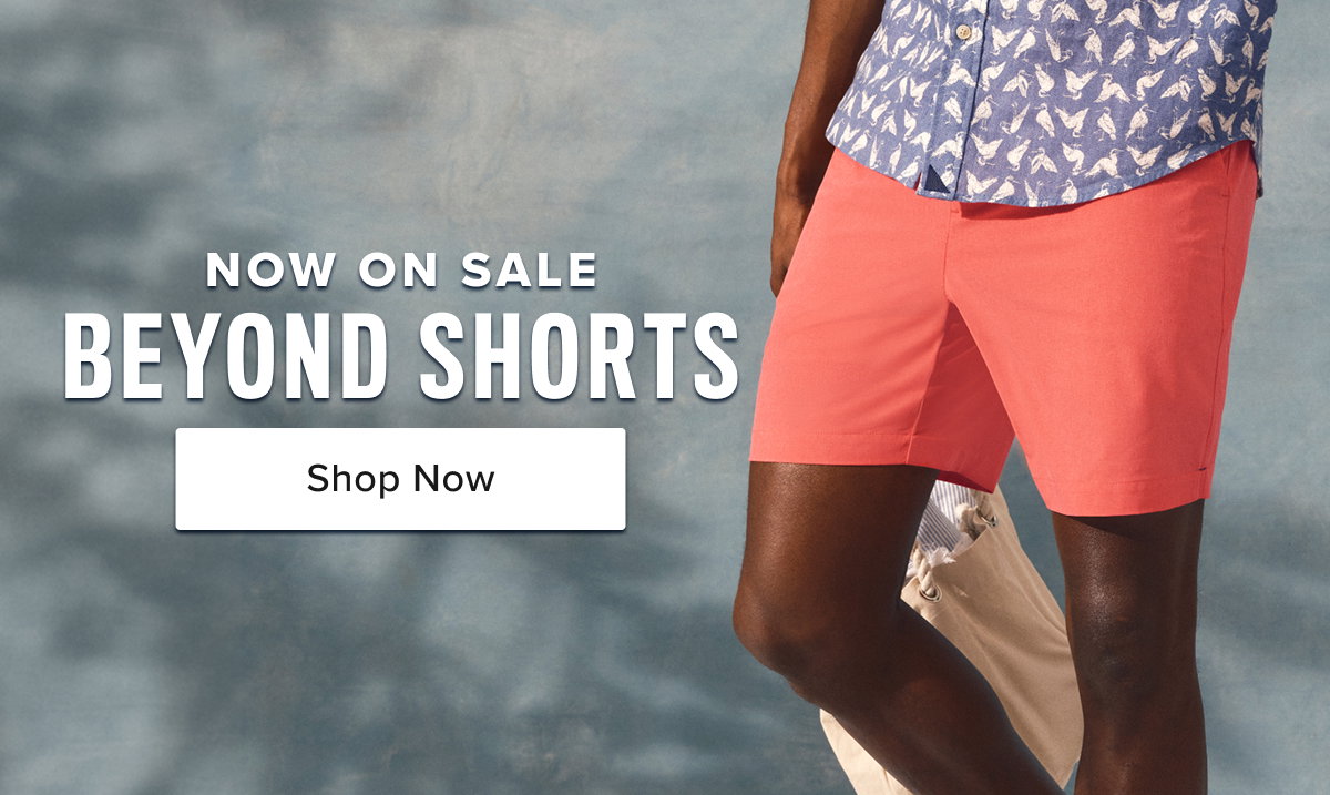 Model is wearing UNTUCKit beyond shorts. 