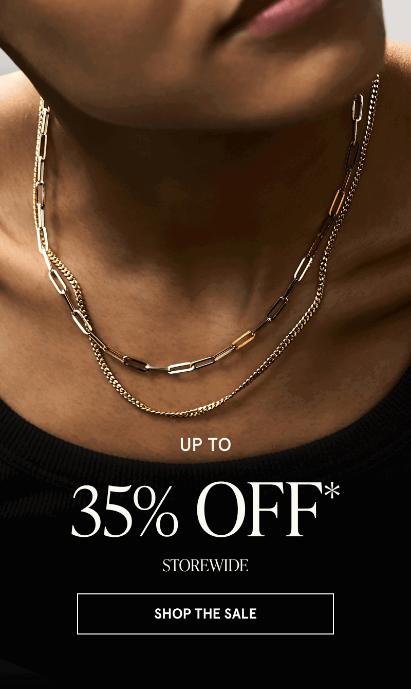 Model in gold necklaces, including paperclip chain.  Up to 35% OFF Storewide. Click here to shop the sale
