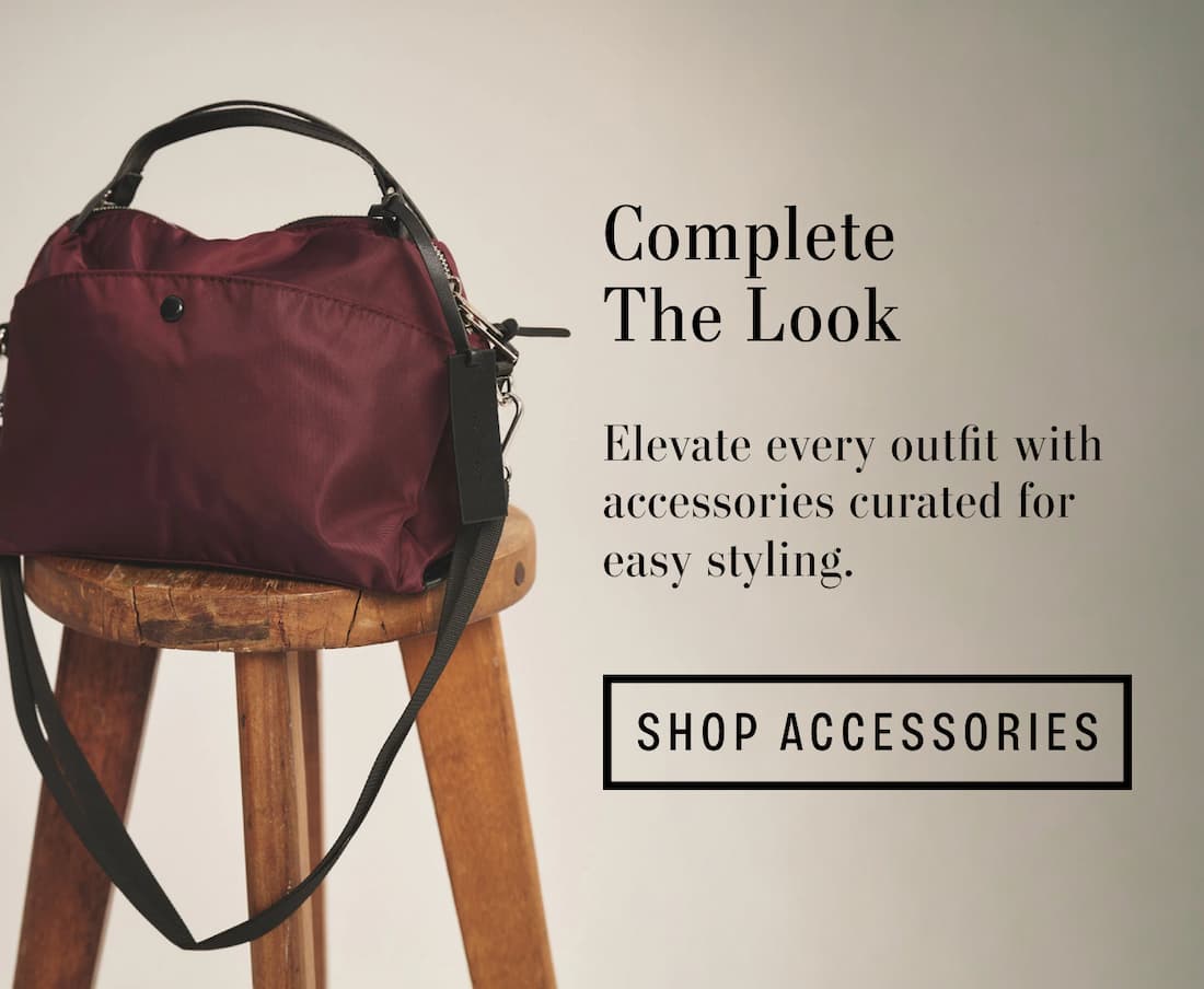 Image of a Nylon Bag in Burgundy. Text reads: Complete The Look. Elevate every outfit with accessories curated for easy styling.