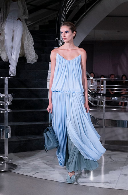 Side image of model on runway wearing Look 14 from the Spring 2027 Runway Collection
