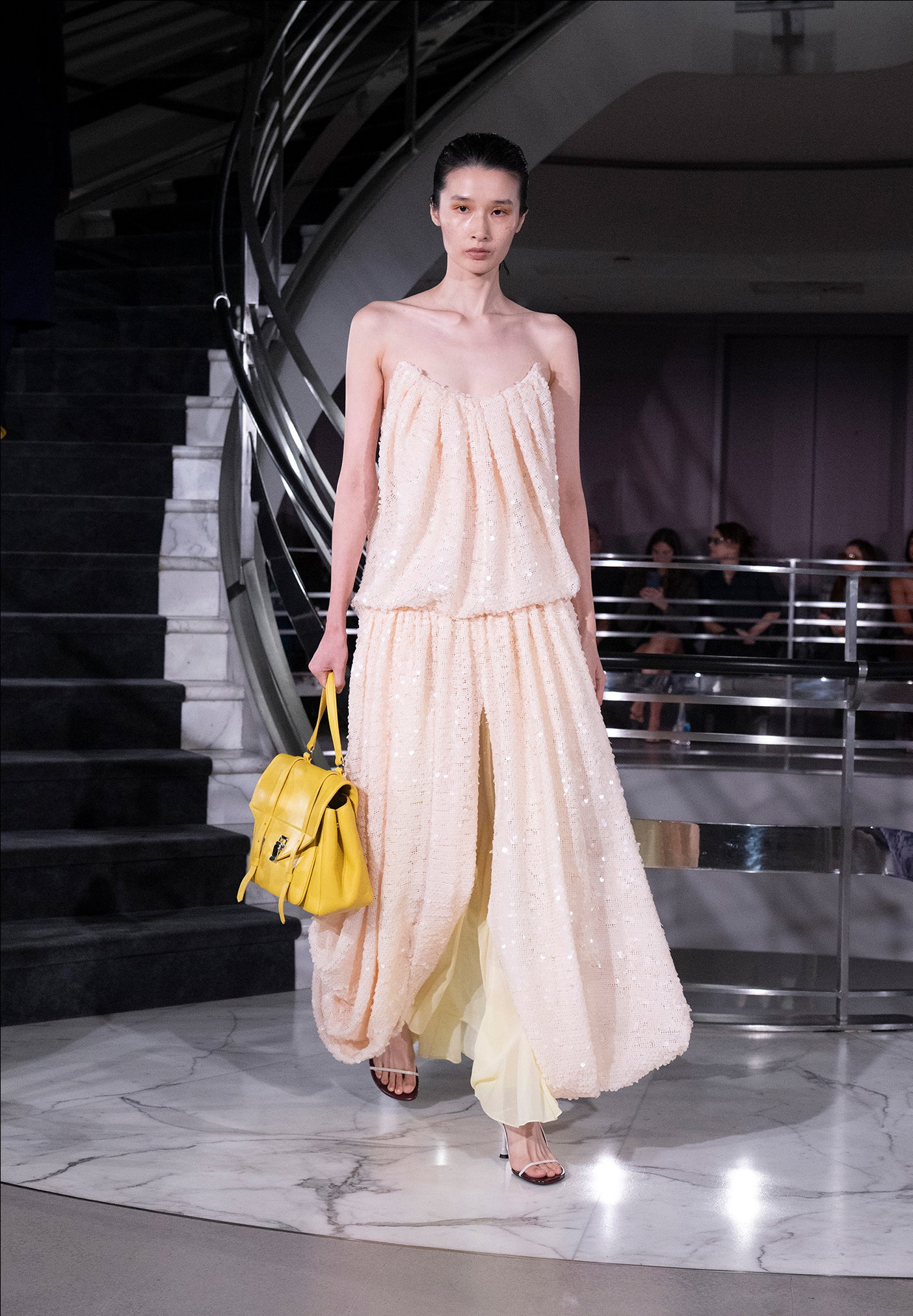 Front image of model on runway wearing Look 21 from the Spring 2027 Runway Collection