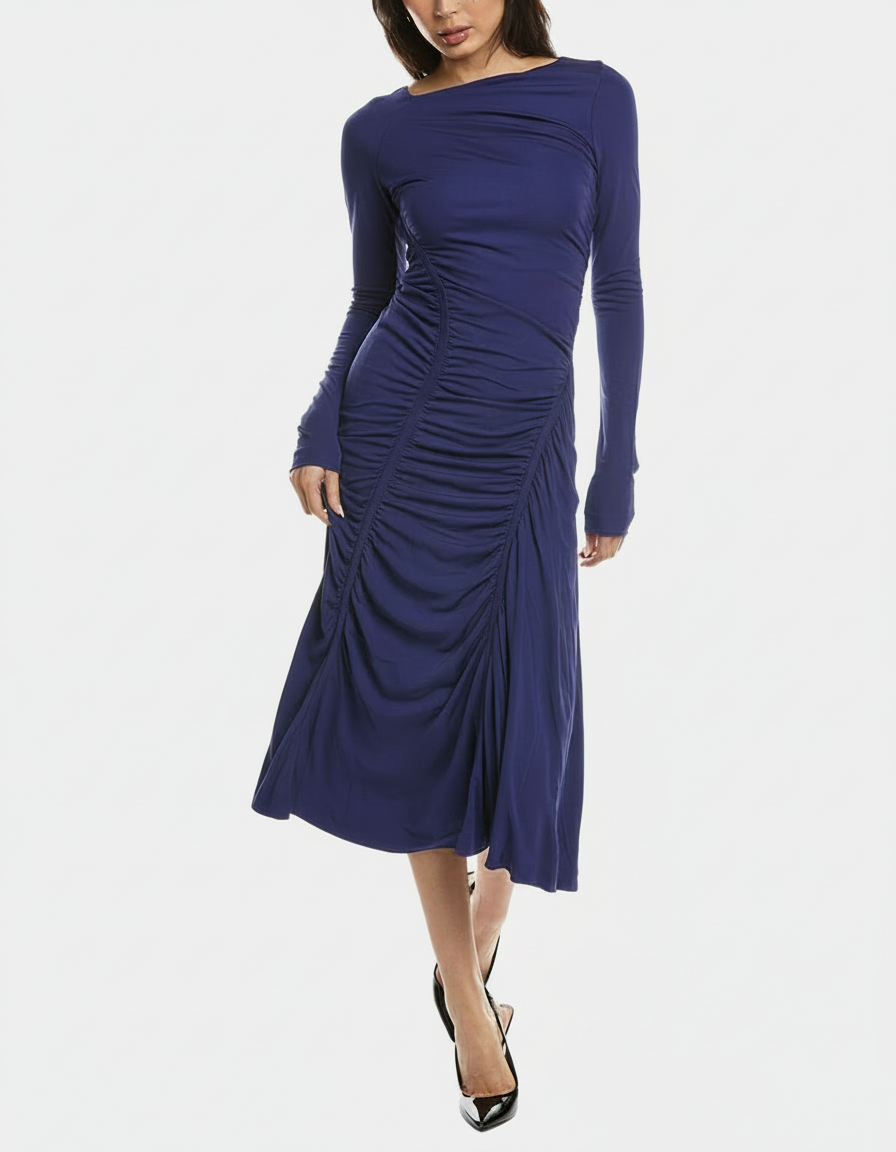 Woman in a navy blue ruched midi dress and black heels.