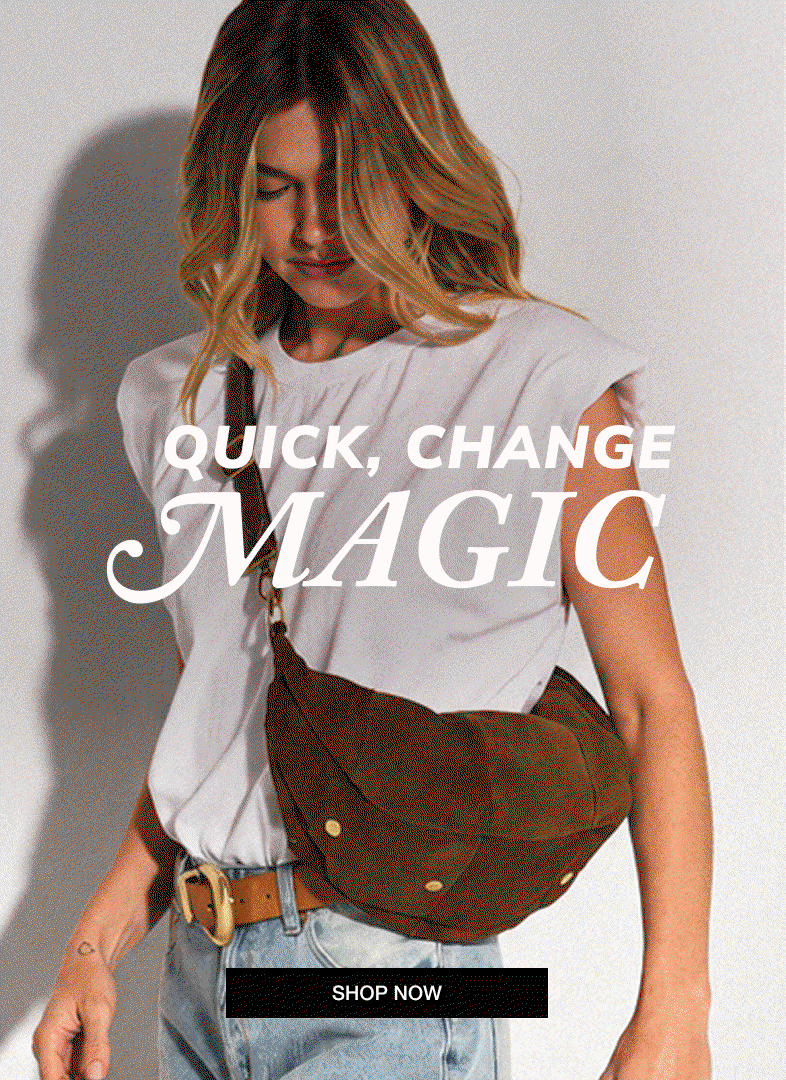 QUICK, CHANGE MAGIC. Model wearing a brown suede crossbody bag with gold hardware. SHOP NOW.