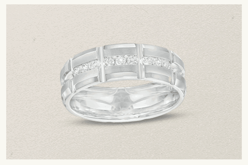 White-metal men's band with segmented design & channel-set diamonds embedded across the center.
