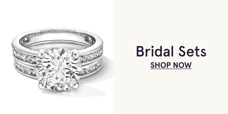 Double layered ring band engraved with stones & round diamond centered stone. Bridal Sets. Click here to shop now